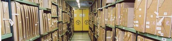 Rows of shelving in a repository at The National Archives in Kew - CC BY The National Archives (United Kingdom) 